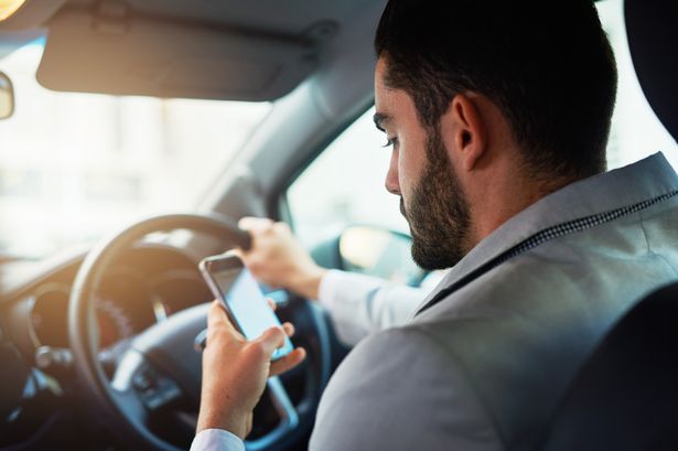 New law bans drivers in one state from touching their phone even for directions.