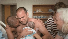 Heartwarming Photo of Two Dads Holding Their Newborn Goes Viral