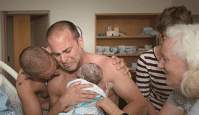 Heartwarming Photo of Two Dads Holding Their Newborn Goes Viral