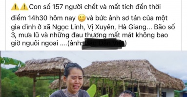 Sự thật về bức ảnh vợ chồng cùng con nhỏ khóc trong 'biển' nước lũ tại Hà Giang